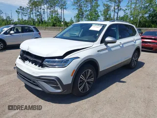 2024 Volkswagen Tiguan with VIN 3VVTB7AX9RM217926, listed as a IAAI auction lot 42339057 with 8,233 mi miles and . Bid and sale history available at DreamBid. Image 2.