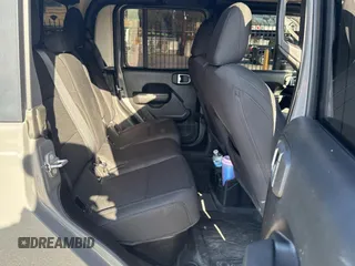 2022 Jeep Gladiator Willys z VIN 1C6HJTAG9NL160131, wystawiony jako Copart lot #50428855 z przebiegiem 56 970 mil mil oraz Czysty tytuł • Clean title. Historia ofert i sprzedaży dostępna na DreamBid. Obrazek 6.