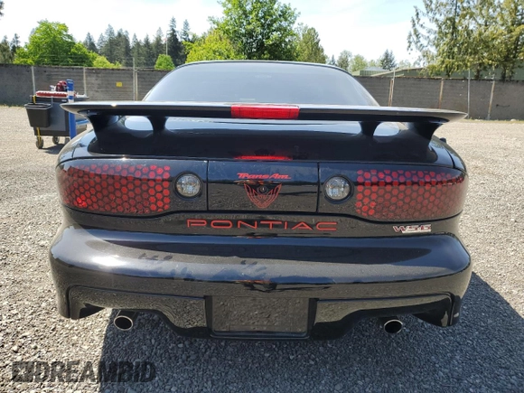 2002 Pontiac Firebird Formula z VIN 2G2FV22G522134431, wystawiony jako Copart lot #56423935 z przebiegiem 46 100 mil mil oraz Szkoda całkowita • Salvage title. Historia ofert i sprzedaży dostępna na DreamBid. Obrazek 6.