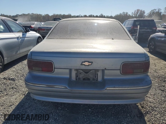 1994 Chevrolet Caprice z VIN 1G1BL52W4RR114969, wystawiony jako Copart lot #76950754 z przebiegiem Nie podano mil oraz Szkoda całkowita • Salvage title. Historia ofert i sprzedaży dostępna na DreamBid. Obrazek 6.