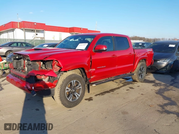 2018 Toyota Tacoma SR with VIN 3TMCZ5ANXJM154305, listed as a IAAI auction lot 41557497 with 182,624 mi miles and . Bid and sale history available at DreamBid. Image 2.