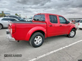 2008 Nissan Frontier SE with VIN 1N6AD07U58C417963, listed as a Copart auction lot 63128965 with 166,470 mi miles and Salvage title. Bid and sale history available at DreamBid. Image 3.