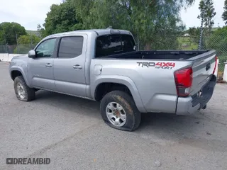 2019 Toyota Tacoma 4WD SR with VIN 3TMCZ5AN4KM194526, listed as a IAAI auction lot 42021504 with 87,767 mi miles. Bid and sale history available at carsss.com. Image 3.