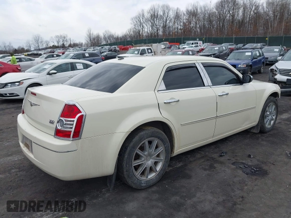 2010 Chrysler 300 Touring with VIN 2C3CK5CV7AH188979, listed as a IAAI auction lot 41674166 with 143,374 mi miles. Bid and sale history available at carsss.com. Image 4.