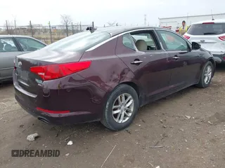 2013 Kia Optima LX with VIN 5XXGM4A70DG091393, listed as a IAAI auction lot 41823880 with 170,966 mi miles. Bid and sale history available at carsss.com. Image 4.