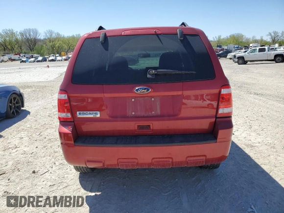 2010 Ford Escape XLT с VIN 1FMCU0D73AKA53589, выставлен на аукционе Copart как лот 53351755 с пробегом 115 997 миль миль и Списание • Salvage title. История ставок и продаж доступна на DreamBid. Изображение 6.