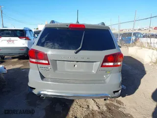 2019 Dodge Journey Crossroad with VIN 3C4PDCGG9KT857575, listed as a IAAI auction lot 41290197 with 91,051 mi miles. Bid and sale history available at carsss.com. Image 16.