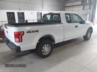 2015 Ford F-150 XLT with VIN 1FTFX1EF3FKD59476, listed as a IAAI auction lot 42622270 with 201,039 mi miles and . Bid and sale history available at DreamBid. Image 4.