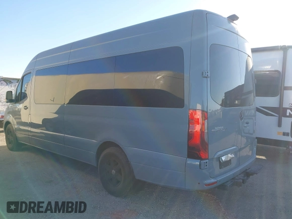 2021 Mercedes-Benz Sprinter Cargo with VIN W1W4ECHY5MT075011, listed as a IAAI auction lot 41364920 with 22,421 mi miles and . Bid and sale history available at carsss.com. Image 3.