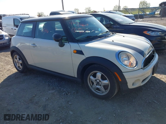 2007 MINI Hardtop with VIN WMWMF33597TU61986, listed as a IAAI auction lot 42139746 with 92,448 mi miles and . Bid and sale history available at DreamBid. Image 1.