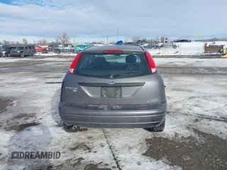 2007 Ford Focus S z VIN 1FAHP31N87W243692, wystawiony jako IAAI lot #41312958 z przebiegiem 184 717 mil mil oraz . Historia ofert i sprzedaży dostępna na DreamBid. Obrazek 16.