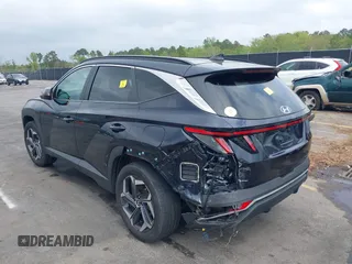 2022 Hyundai Tucson SEL Convenience with VIN KM8JFCA10NU049450, listed as a IAAI auction lot 41915300 with 23,584 mi miles and . Bid and sale history available at carsss.com. Image 3.