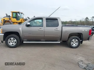 2013 Chevrolet Silverado 1500 LT with VIN 3GCPKSE74DG332907, listed as a IAAI auction lot 41951755 with 214,211 mi miles. Bid and sale history available at carsss.com. Image 14.