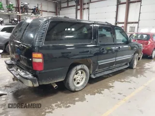 2002 Chevrolet Suburban Z71 with VIN 3GNFK16Z42G305930, listed as a IAAI auction lot 41002347 with 288,355 mi miles. Bid and sale history available at carsss.com. Image 4.
