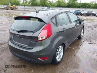 2018 Ford Fiesta SE with VIN 3FADP4EJ7JM130027, listed as a IAAI auction lot 42171799 with 65,253 mi miles and . Bid and sale history available at DreamBid. Image 4.