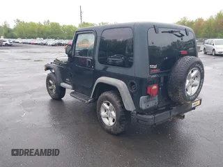 2004 Jeep Wrangler X with VIN 1J4FA39S94P707411, listed as a IAAI auction lot 42187856 with 189,519 mi miles. Bid and sale history available at carsss.com. Image 3.