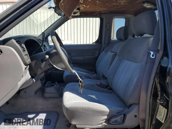 1999 Nissan Frontier XE with VIN 1N6DD26S6XC327079, listed as a Copart auction lot 49295335 with 170,753 mi miles and Salvage title. Bid and sale history available at DreamBid. Image 7.