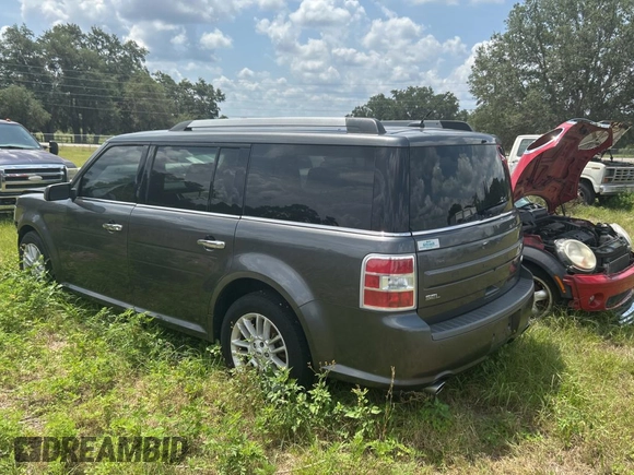 2016 Ford Flex SEL z VIN 2FMGK5C83GBA09724, wystawiony jako Copart lot #56397205 z przebiegiem 188 103 mil mil oraz Czysty tytuł • Clean title. Historia ofert i sprzedaży dostępna na DreamBid. Obrazek 3.