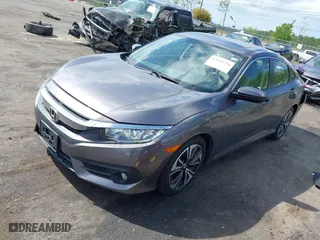 2018 Honda Civic Sedan EX-L with VIN JHMFC1F72JX044147, listed as a IAAI auction lot 42012754 with 86,264 mi miles. Bid and sale history available at carsss.com. Image 2.