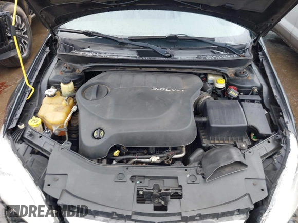 2013 Chrysler 200 Limited with VIN 1C3CCBCG1DN540060, listed as a IAAI auction lot 41508685 with 152,296 mi miles. Bid and sale history available at carsss.com. Image 10.