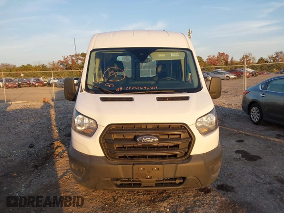 2020 Ford Transit Cargo with VIN 1FTBR1C83LKB60548, listed as a IAAI auction lot 41481254 with 77,761 mi miles and . Bid and sale history available at DreamBid. Image 12.