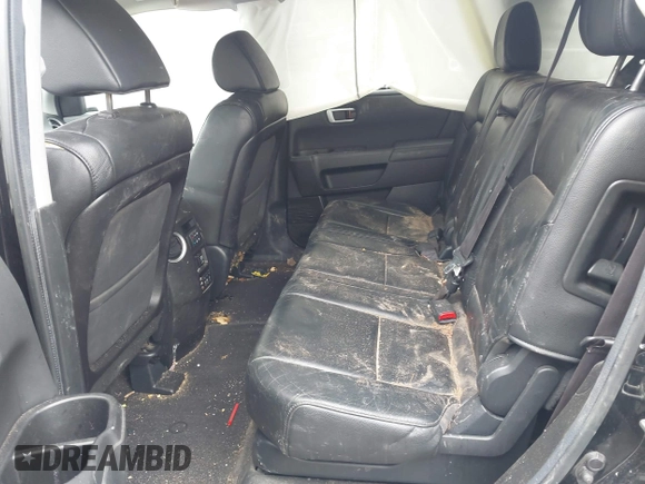 2012 Honda Pilot Touring with VIN 5FNYF4H93CB071923, listed as a IAAI auction lot 41946074 with 175,663 mi miles and . Bid and sale history available at carsss.com. Image 8.