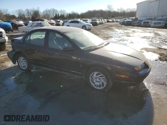 2000 Saturn SL with VIN 1G8ZH5283YZ169267, listed as a Copart auction lot 42626335 with 131,556 mi miles and Salvage Title. Bid and sale history available at carsss.com. Image 4.