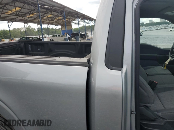2023 Ford F-150 XL with VIN 1FTMF1C57PKF86630, listed as a Copart auction lot 59172785 with 14,840 mi miles and Salvage title. Bid and sale history available at DreamBid. Image 10.
