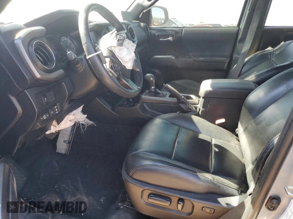2021 Toyota Tacoma SR5 with VIN 3TMDZ5BN9MM099515, listed as a Copart auction lot 56687385 with 66,721 mi miles and Salvage title. Bid and sale history available at DreamBid. Image 7.