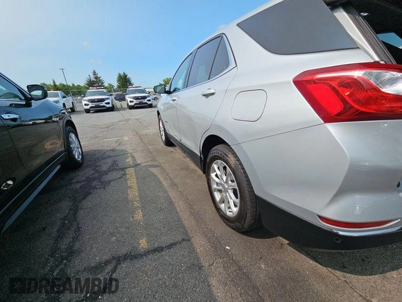 2020 Chevrolet Equinox LT z VIN 2GNAXJEV9L6155319, wystawiony jako IAAI lot #42575790 z przebiegiem 84 186 mil mil oraz . Historia ofert i sprzedaży dostępna na DreamBid. Obrazek 20.