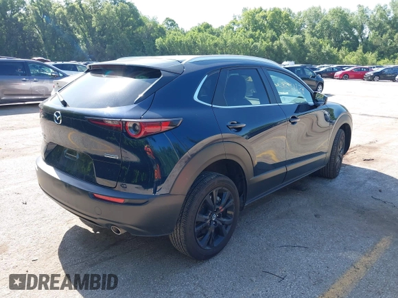 2024 Mazda CX-30 S Select Sport with VIN 3MVDMBBM7RM698178, listed as a IAAI auction lot 42561338 with 25,112 mi miles and . Bid and sale history available at DreamBid. Image 4.