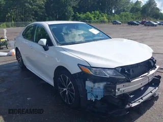 2019 Toyota Camry LE z VIN 4T1B11HK8KU708943, wystawiony jako IAAI lot #42221233 z przebiegiem 173 813 mil mil oraz . Historia ofert i sprzedaży dostępna na DreamBid. Obrazek 1.