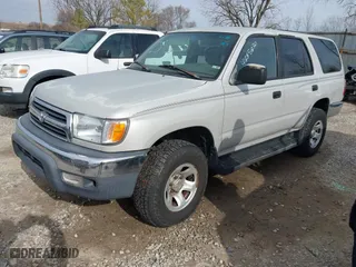 2000 Toyota 4Runner with VIN JT3GM84R6Y0055563, listed as a IAAI auction lot 41885830 with 243,885 mi miles. Bid and sale history available at carsss.com. Image 2.