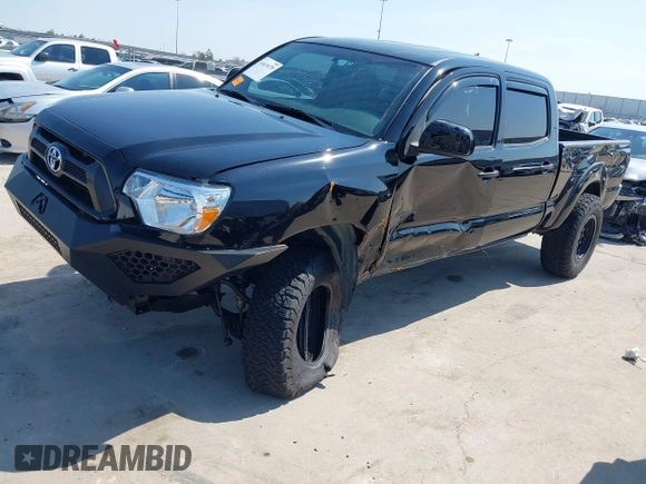 2014 Toyota Tacoma PreRunner with VIN 3TMKU4HN0EM040104, listed as a IAAI auction lot 41619179 with 171,542 mi miles and . Bid and sale history available at DreamBid. Image 2.