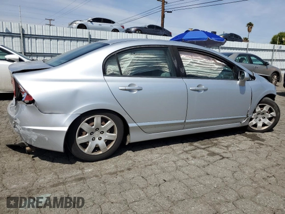 2010 Honda Civic LX with VIN 2HGFA1F57AH586100, listed as a Copart auction lot 50066965 with 192,401 mi miles and Salvage Title. Bid and sale history available at DreamBid. Image 3.