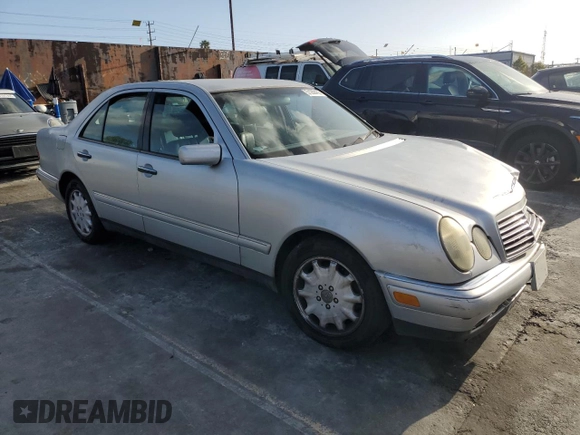 1998 Mercedes-Benz E 320 with VIN WDBJF25F3WA689755, listed as a Copart auction lot 51288455 with 124,157 mi miles and Salvage Title. Bid and sale history available at DreamBid. Image 4.