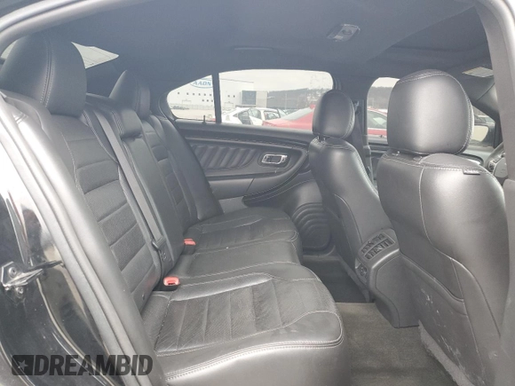2014 Ford Taurus SHO with VIN 1FAHP2KT4EG116744, listed as a Copart auction lot 44947915 with 138,757 mi miles and Clean Title. Bid and sale history available at carsss.com. Image 10.