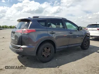 2018 Toyota RAV4 LE with VIN 2T3BFREV1JW757258, listed as a Copart auction lot 52914565 with 61,237 mi miles and Salvage Title. Bid and sale history available at carsss.com. Image 3.