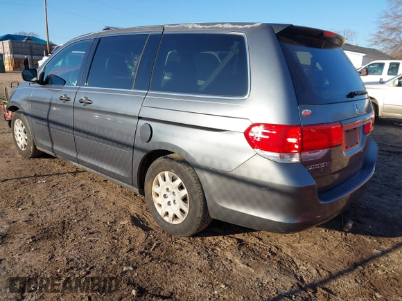 2010 Honda Odyssey LX with VIN 5FNRL3H28AB026712, listed as a IAAI auction lot 41281625 with 223,905 mi miles. Bid and sale history available at carsss.com. Image 3.