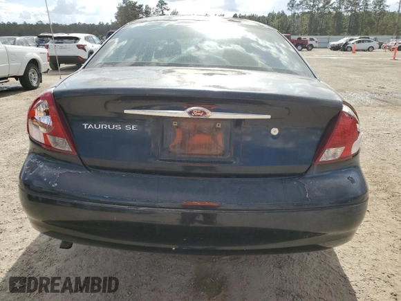 2000 Ford Taurus SE with VIN 1FAFP53U9YG285971, listed as a Copart auction lot 78138984 with 182,135 mi miles and Salvage Title. Bid and sale history available at DreamBid. Image 6.