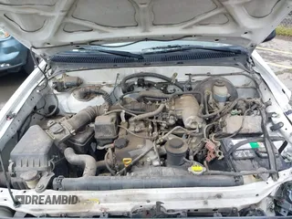 2002 Toyota Tacoma z VIN 5TENL42N02Z099046, wystawiony jako IAAI lot #41774946 z przebiegiem 189 134 mil mil oraz . Historia ofert i sprzedaży dostępna na DreamBid. Obrazek 10.
