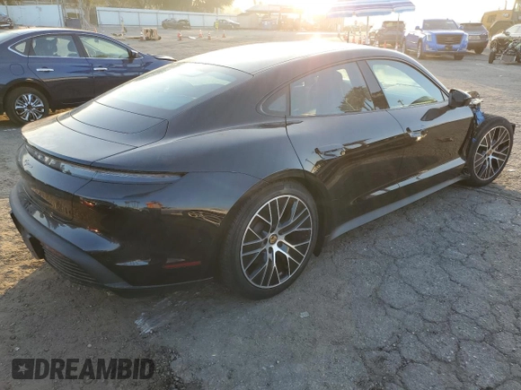 2024 Porsche Taycan with VIN WP0AA2Y10RSA10283, listed as a Copart auction lot 82637484 with 3,036 mi miles and Salvage title. Bid and sale history available at DreamBid. Image 3.