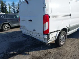 2021 Ford Transit Cargo z VIN 1FTYE1Y89MKA16809, wystawiony jako IAAI lot #41643195 z przebiegiem 7 407 mil mil oraz . Historia ofert i sprzedaży dostępna na DreamBid. Obrazek 6.