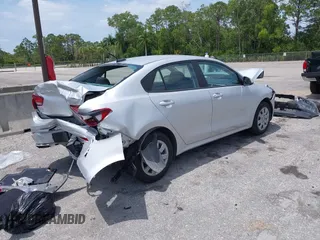2023 Kia Rio S z VIN 3KPA24AD4PE604207, wystawiony jako IAAI lot #42077201 z przebiegiem 16 559 mil mil oraz . Historia ofert i sprzedaży dostępna na DreamBid. Obrazek 4.