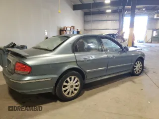 2004 Hyundai Sonata GLS with VIN KMHWF35HX4A062686, listed as a Copart auction lot 74906214 with 0 mi miles and Salvage Title. Bid and sale history available at carsss.com. Image 4.