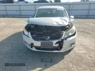 2010 Volkswagen Tiguan S with VIN WVGAV7AX9AW519312, listed as a Copart auction lot 48633055 with 94,740 mi miles and Salvage title. Bid and sale history available at DreamBid. Image 10.