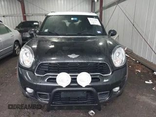 2014 MINI Countryman S with VIN WMWZC5C53EWP40677, listed as a IAAI auction lot 41473281 with 108,616 mi miles and . Bid and sale history available at DreamBid. Image 12.