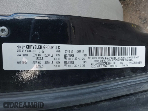 2012 Dodge Grand Caravan SXT with VIN 2C4RDGCG3CR318900, listed as a IAAI auction lot 41145958 with 201,117 mi miles and . Bid and sale history available at DreamBid. Image 9.
