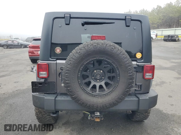 2018 Jeep Wrangler JK Unlimited Sport S with VIN 1C4HJWDG2JL839433, listed as a Copart auction lot 51376545 with 124,012 mi miles and Salvage Title. Bid and sale history available at carsss.com. Image 6.