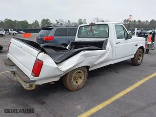 1996 Ford F-150 Special with VIN 1FTEF15Y0TLC18418, listed as a IAAI auction lot 41468561 with 167,001 mi miles. Bid and sale history available at carsss.com. Image 4.